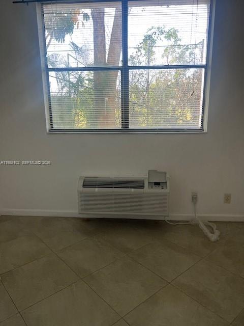 2401 Riverside Drive, Unit 110B Coral Springs, FL 33065 - Photo 9 of 27 a view of a room with a window