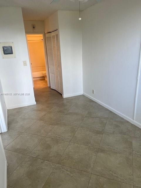 2401 Riverside Drive, Unit 110B Coral Springs, FL 33065 - Photo 10 of 27 an empty room with a window