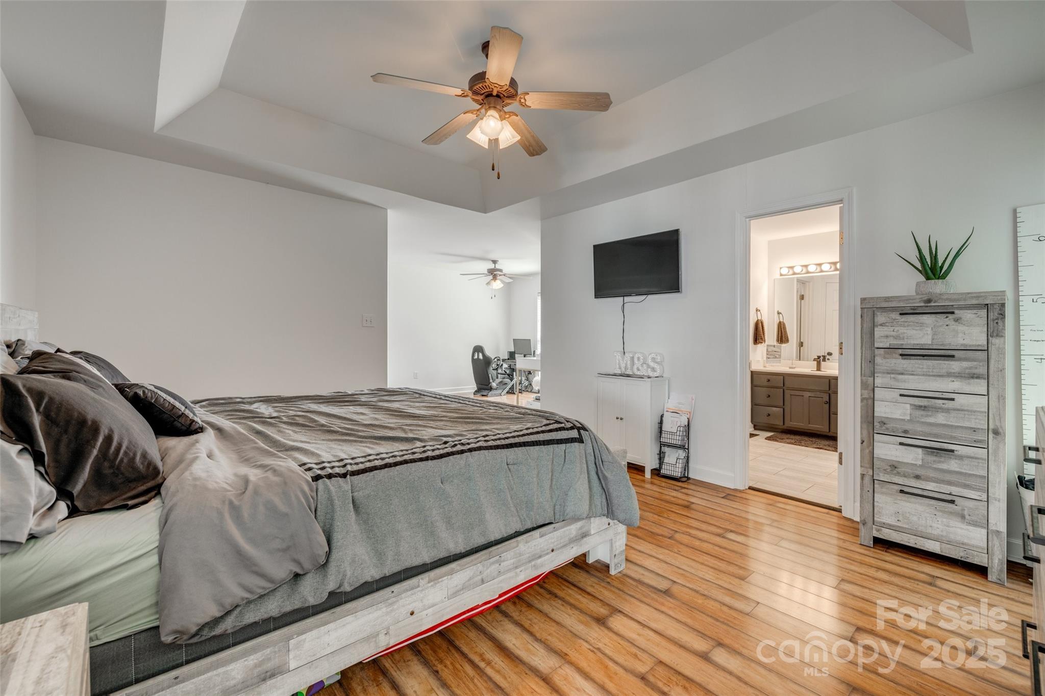 1140 Landsdown Drive Salisbury, NC 28147 - Photo 21 of 37 a bedroom with a bed and a television