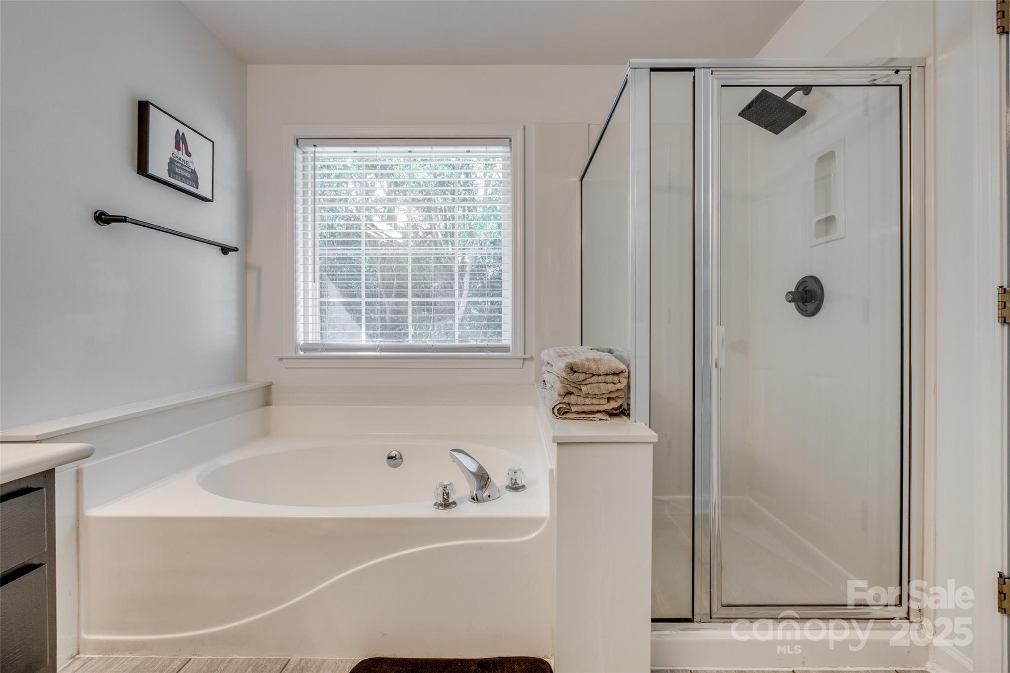 1140 Landsdown Drive Salisbury, NC 28147 - Photo 24 of 37 a white bath tub sitting next to a window