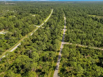 a view of a field with an outdoor space