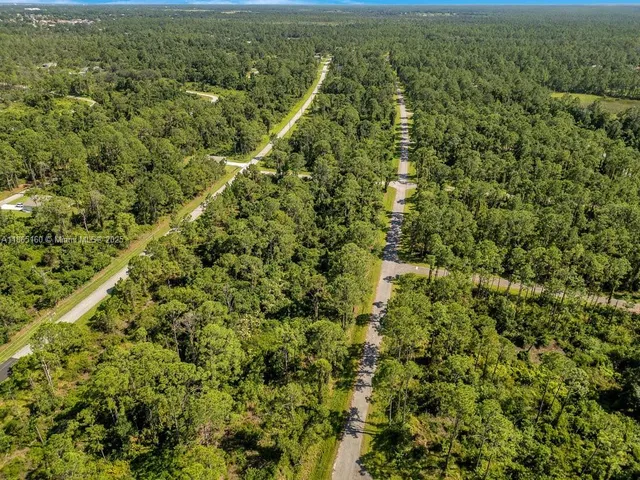 a view of a field with an outdoor space