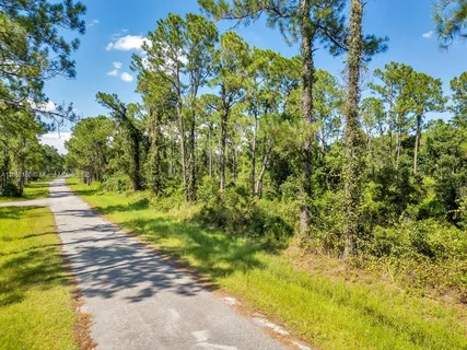 a view of a field with an outdoor space