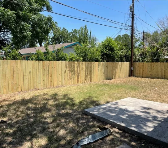 a view of yard with a small pool