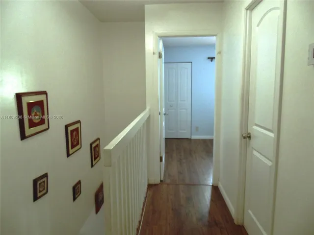 a view of outdoor space with playground and green space