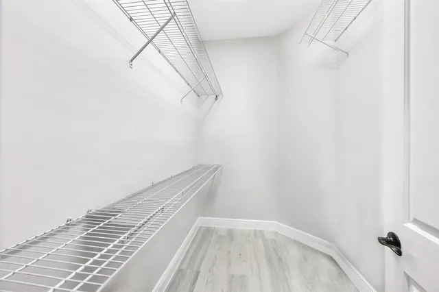 a view of a room with racks on the wall