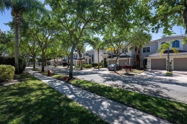 a view of a swimming pool with a lounge chair