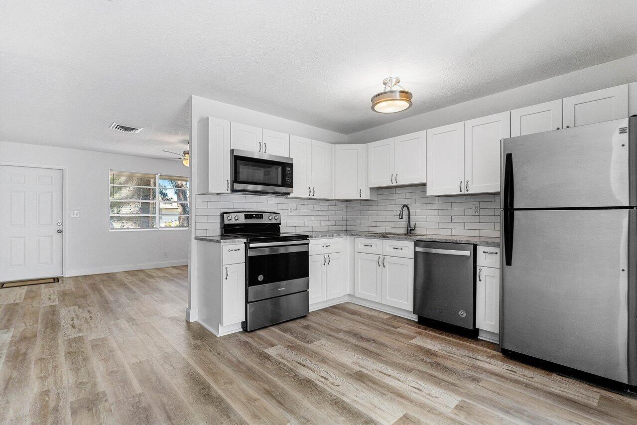 4778 Gladiator Circle Greenacres, FL 33463 - Photo 12 of 33 013-4778GladiatorCircle-Greenacres-FL-33