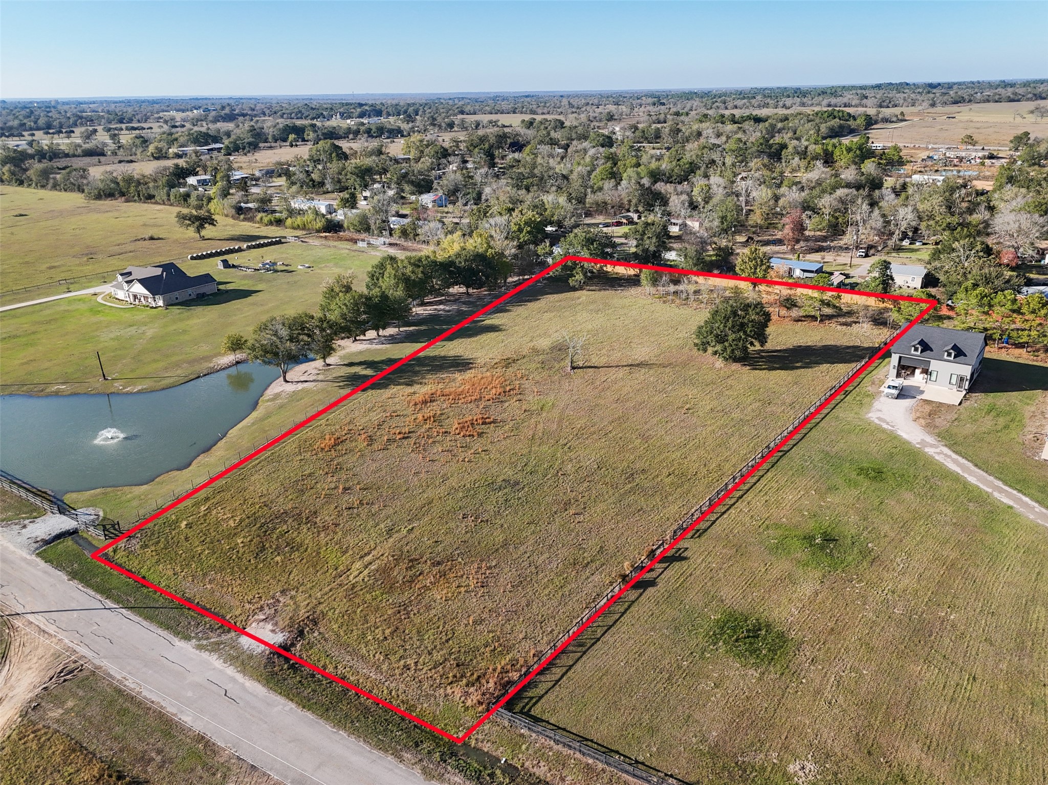 23300 Legacy Lane Hempstead, TX 77445 - Photo 4 of 10 swimming pool view with a lake view