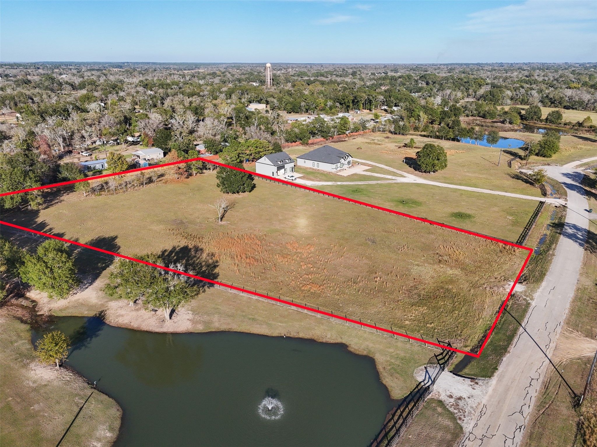 23300 Legacy Lane Hempstead, TX 77445 - Photo 9 of 10 an aerial view of a house