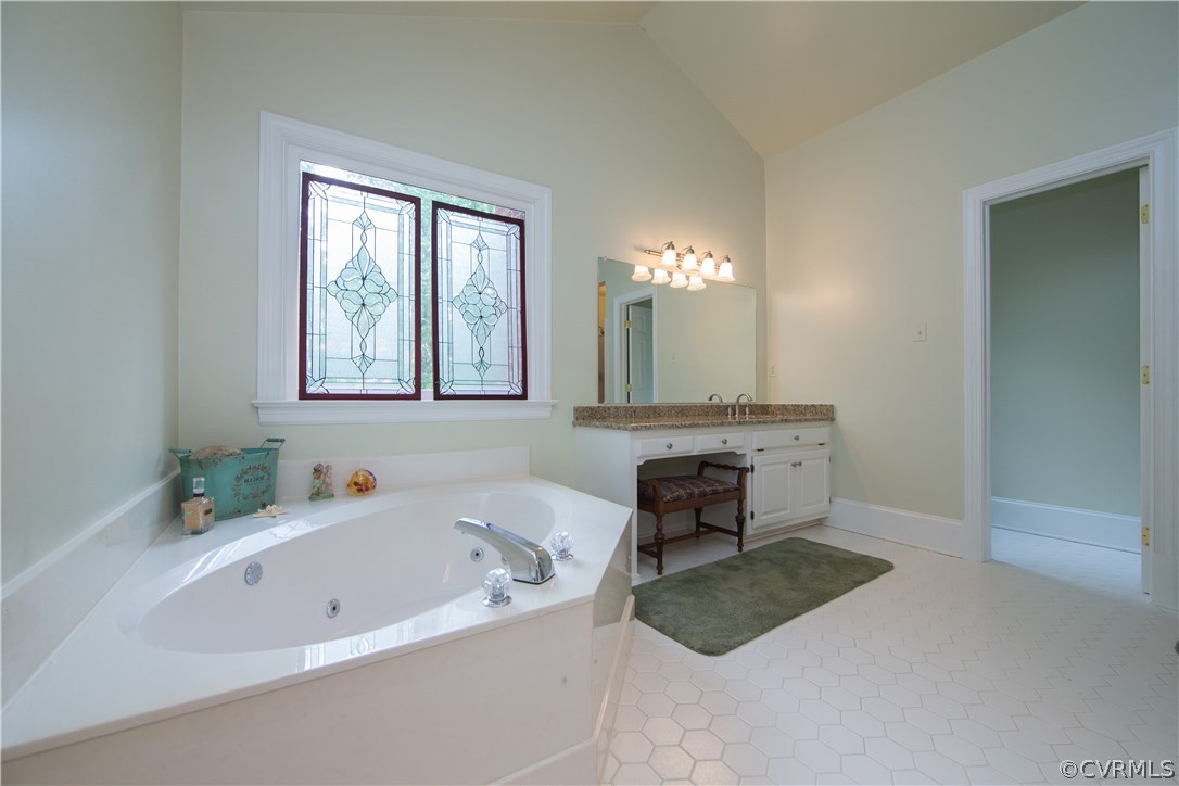 14481 West Salisbury Road Midlothian, VA 23113 - Photo 24 of 49 a bathroom with a tub sink and window