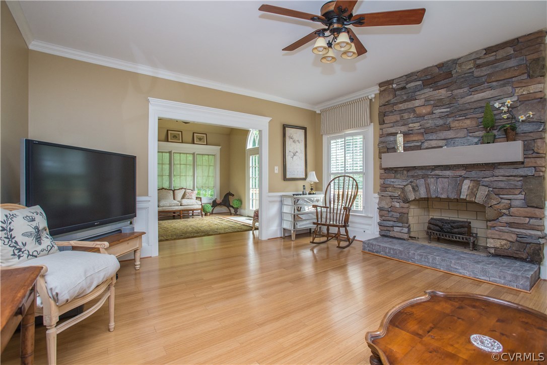 14481 West Salisbury Road Midlothian, VA 23113 - Photo 7 of 49 a living room with furniture and a flat screen tv