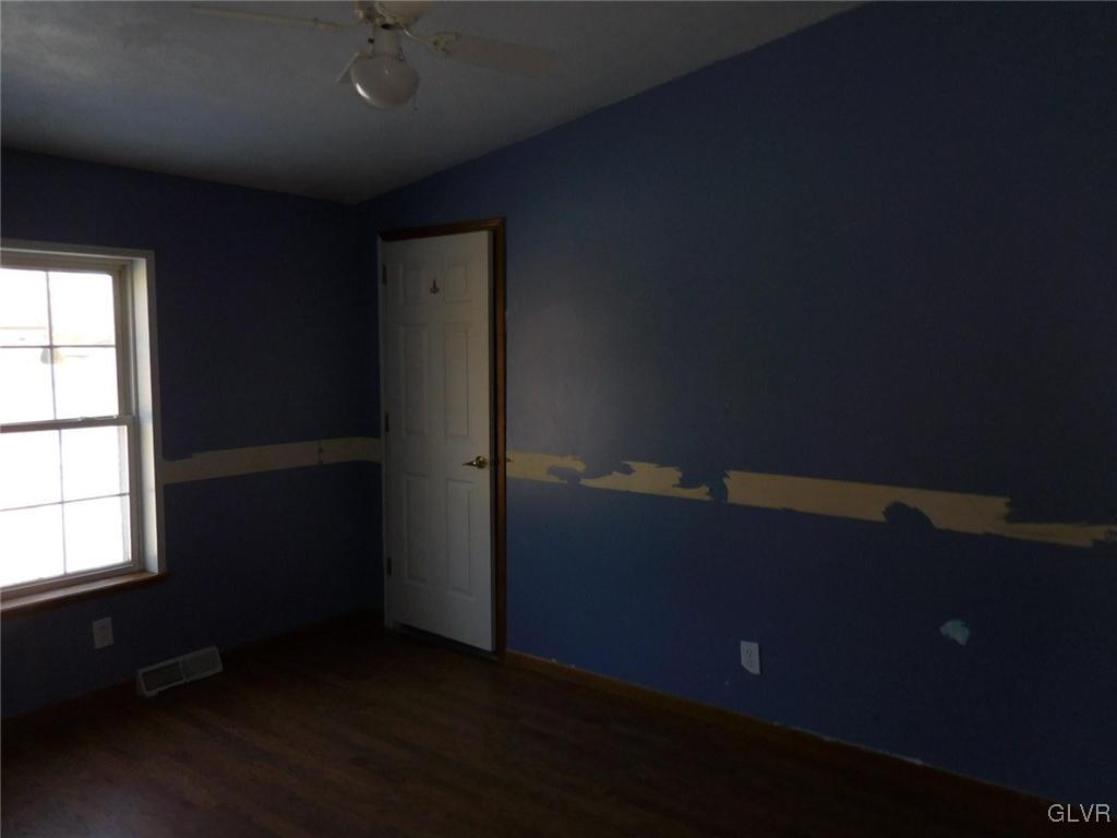 698 Point Phillips Road Bath, PA 18014 - Photo 7 of 10 an empty room with a empty space and window