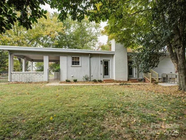 front view of a house with a big yard