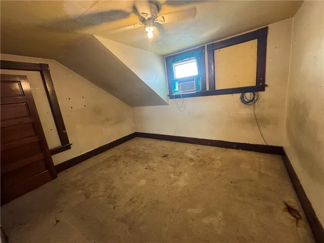 a view of an empty room and window