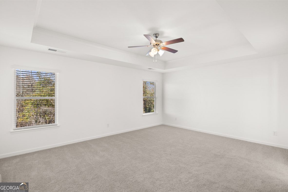 408 Hazel Drive Locust Grove, GA 30248 - Photo 15 of 32 a view of an empty room with a window