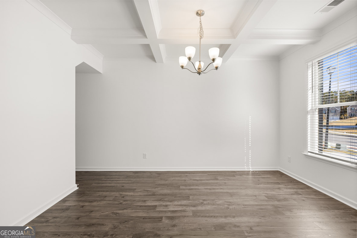 408 Hazel Drive Locust Grove, GA 30248 - Photo 2 of 32 a view of empty room with wooden floor and window