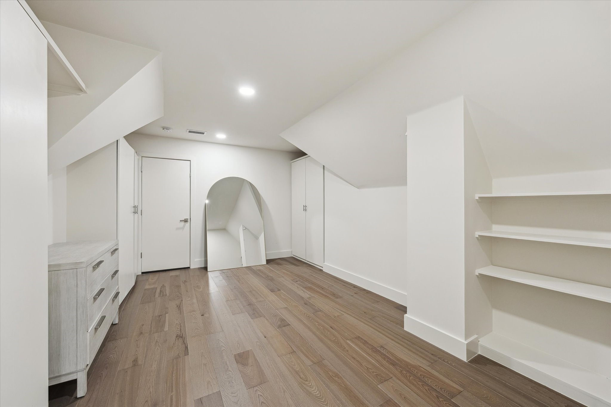 6348 Vanderbilt Street West University Place, TX 77005 - Photo 25 of 30 A walk-in closet that thinks bigger. Built-in shelving, multiple storage sections, and generous square footage make this space as versatile as it is impressive — dream closet, nursery, sitting room, or private dressing suite.