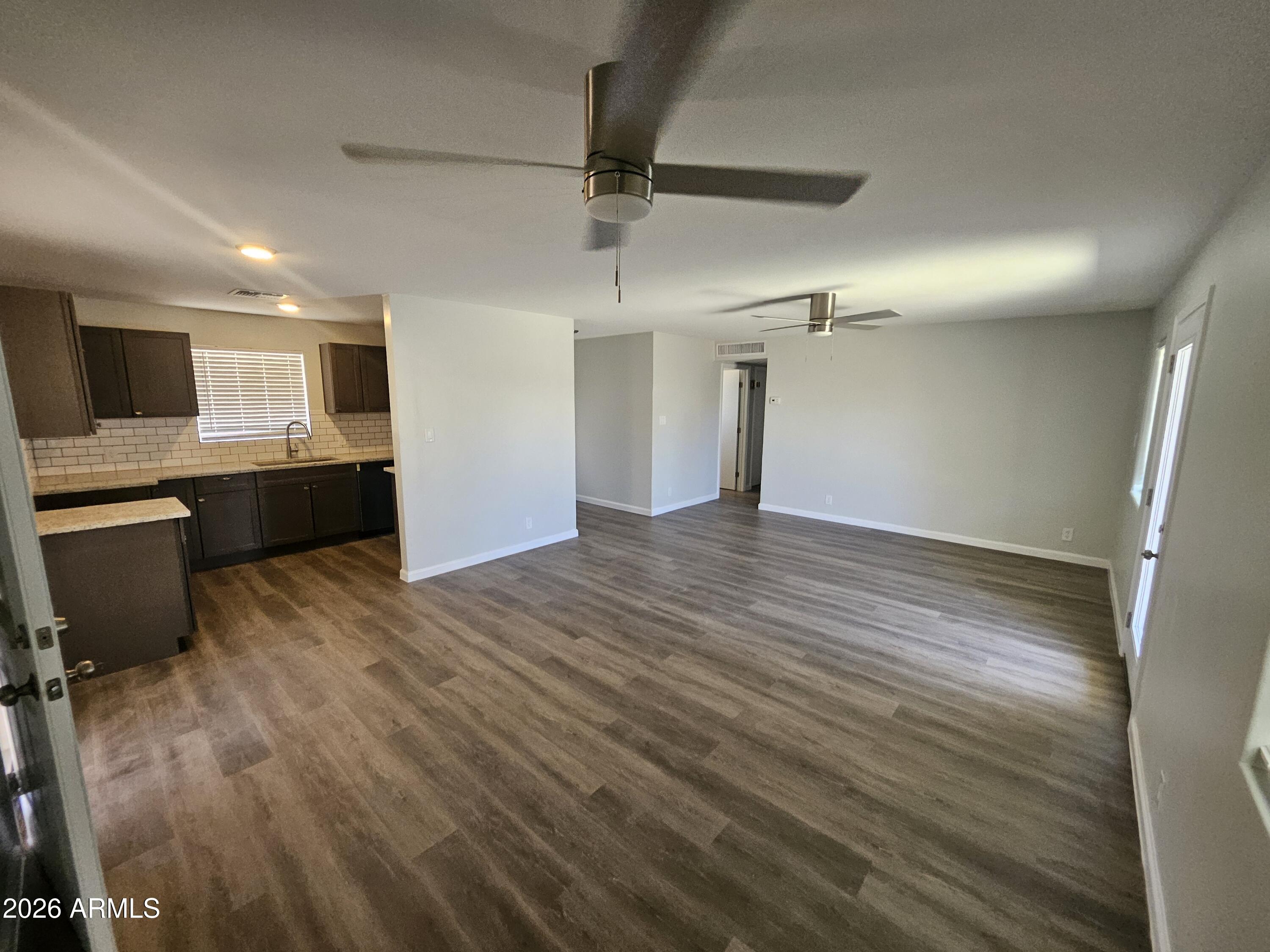 524 West 3rd Place Mesa, AZ 85201 - Photo 7 of 23 a view of kitchen and empty room