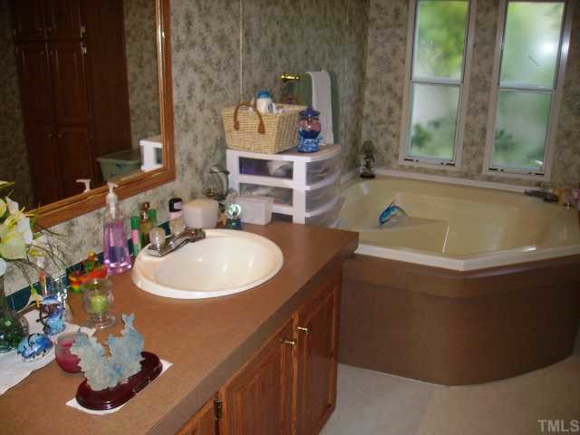 949 Long Mill Road Franklinton, NC 27525 - Photo 8 of 11 DOUBLE VANITY AND LARGE SOAKING TUB SEPARATE SHOWER