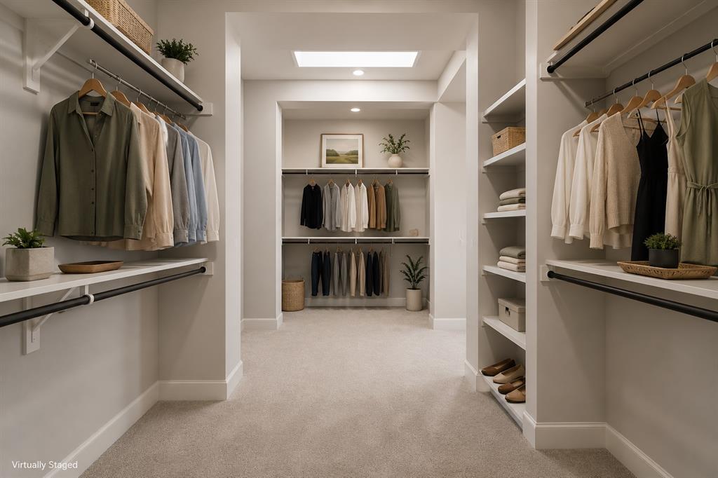 2813 Trinity Ridge Street Mansfield, TX 76063 - Photo 11 of 27 Spacious walk-in closet featuring extensive built-in shelving and hanging rods