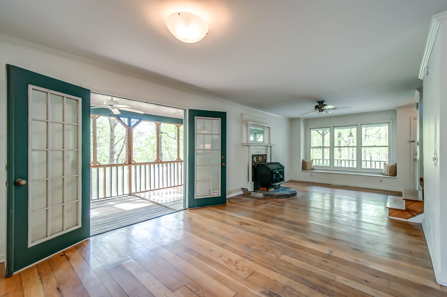 1136 Dora Whitley Road Franklin, TN 37064 - Photo 12 of 37 an empty room with wooden floor and windows