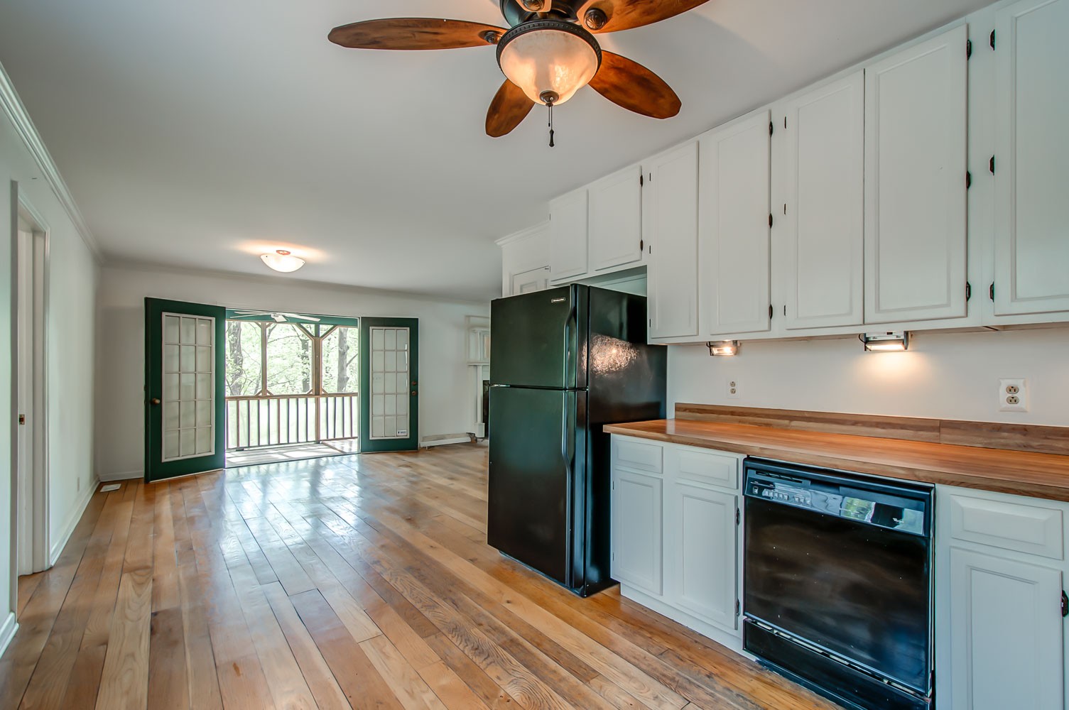 1136 Dora Whitley Road Franklin, TN 37064 - Photo 14 of 37 a kitchen with stainless steel appliances granite countertop a stove a refrigerator and a microwave