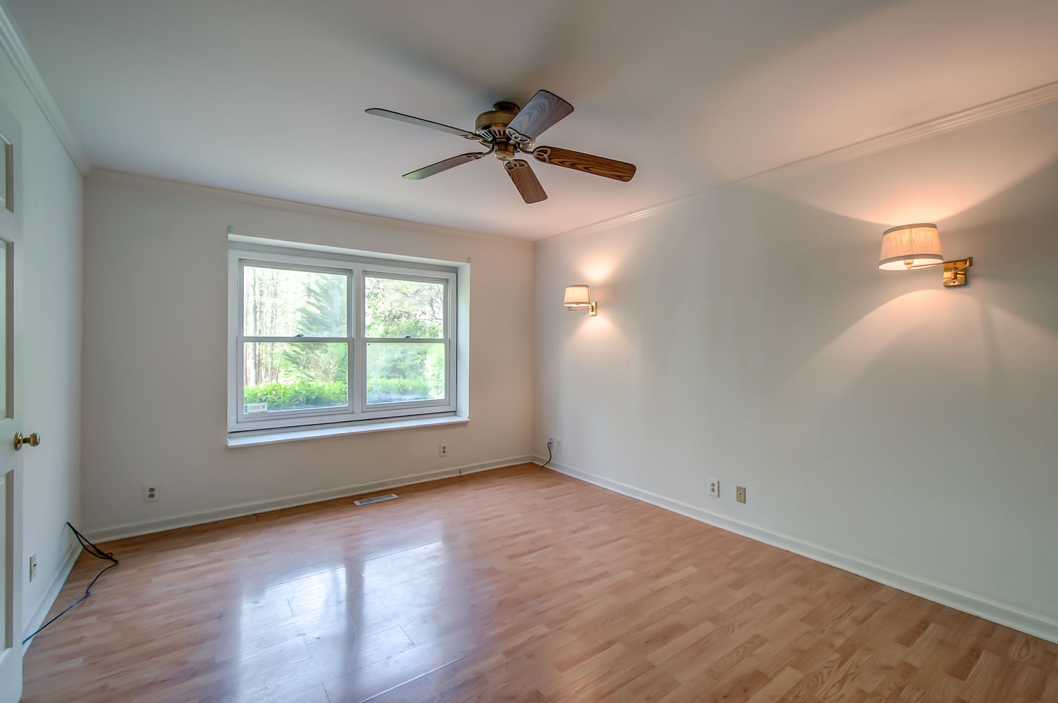 1136 Dora Whitley Road Franklin, TN 37064 - Photo 16 of 37 an empty room with wooden floor fan and windows
