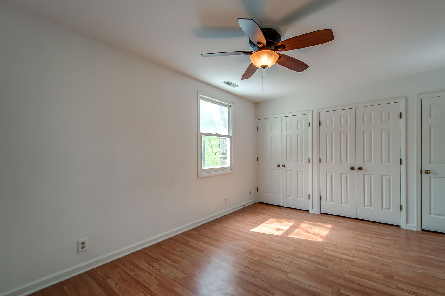 1136 Dora Whitley Road Franklin, TN 37064 - Photo 22 of 37 a view of an empty room with window and wooden floor