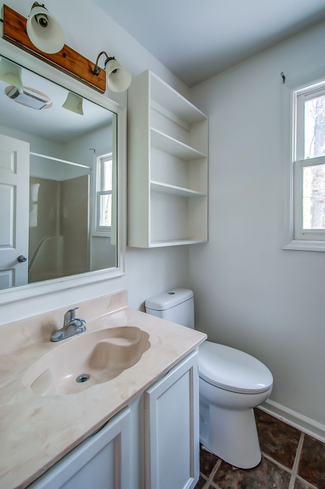 1136 Dora Whitley Road Franklin, TN 37064 - Photo 25 of 37 a bathroom with a sink toilet and mirror