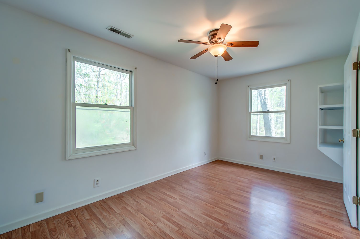 1136 Dora Whitley Road Franklin, TN 37064 - Photo 26 of 37 a view of an empty room with wooden floor and a window