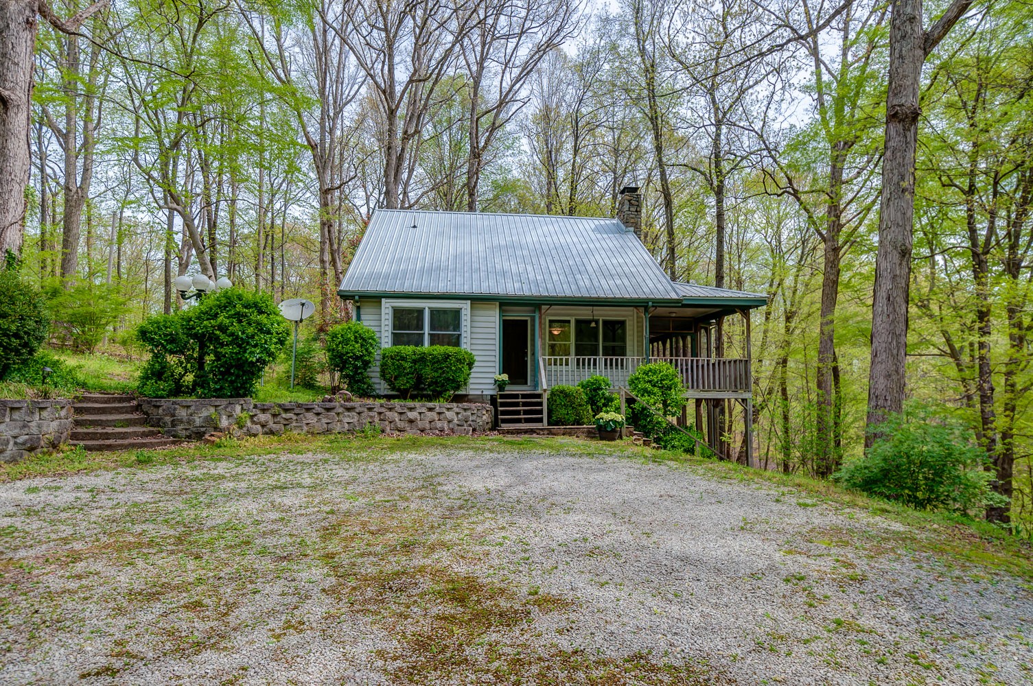 1136 Dora Whitley Road Franklin, TN 37064 - Photo 3 of 37 a front view of a house with a garden