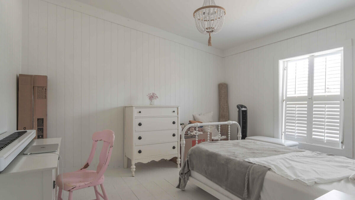 119 Edgewood Terrace Santa Rosa Beach, FL 32459 - Photo 16 of 23 a bedroom with a bed and a chair