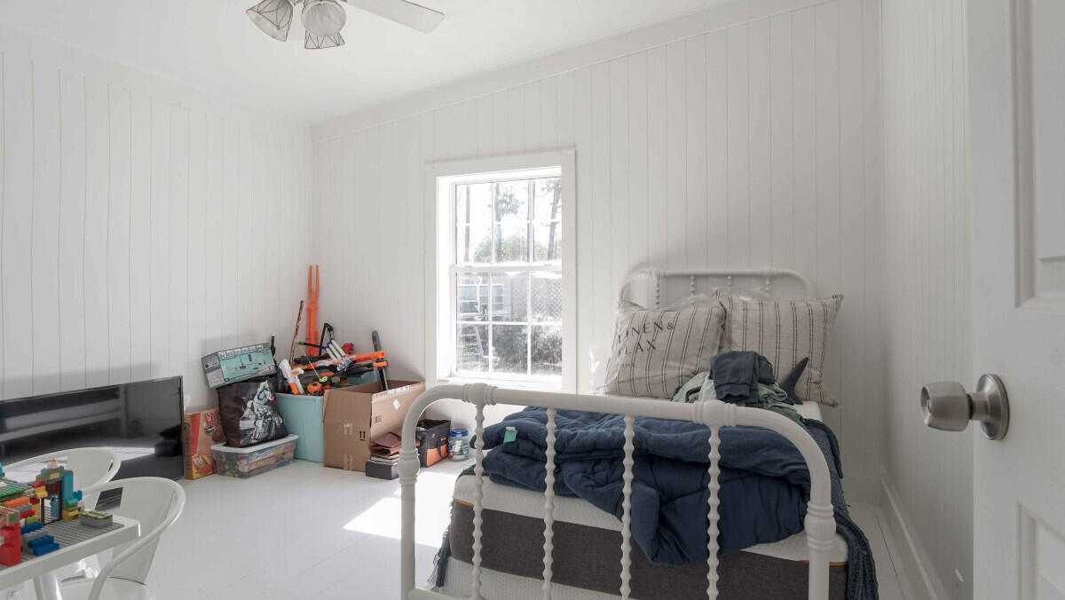 119 Edgewood Terrace Santa Rosa Beach, FL 32459 - Photo 17 of 23 a bedroom with a bed and a window