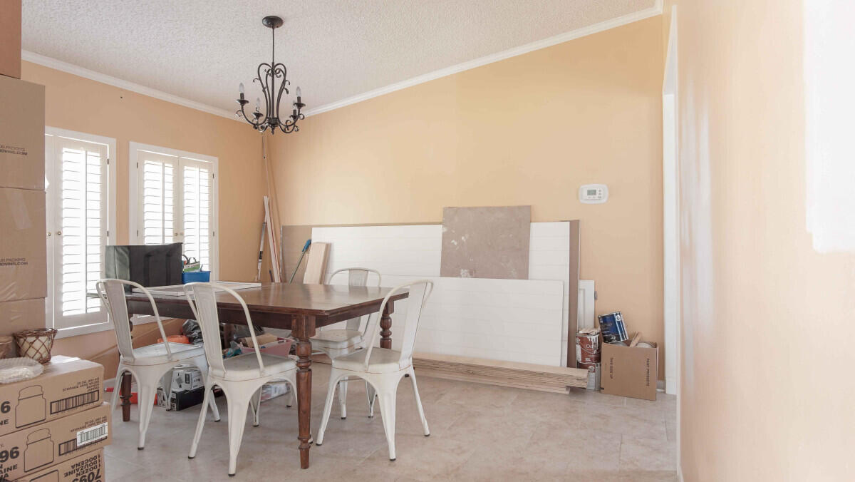 119 Edgewood Terrace Santa Rosa Beach, FL 32459 - Photo 19 of 23 a view of a dining room with furniture and a chandelier