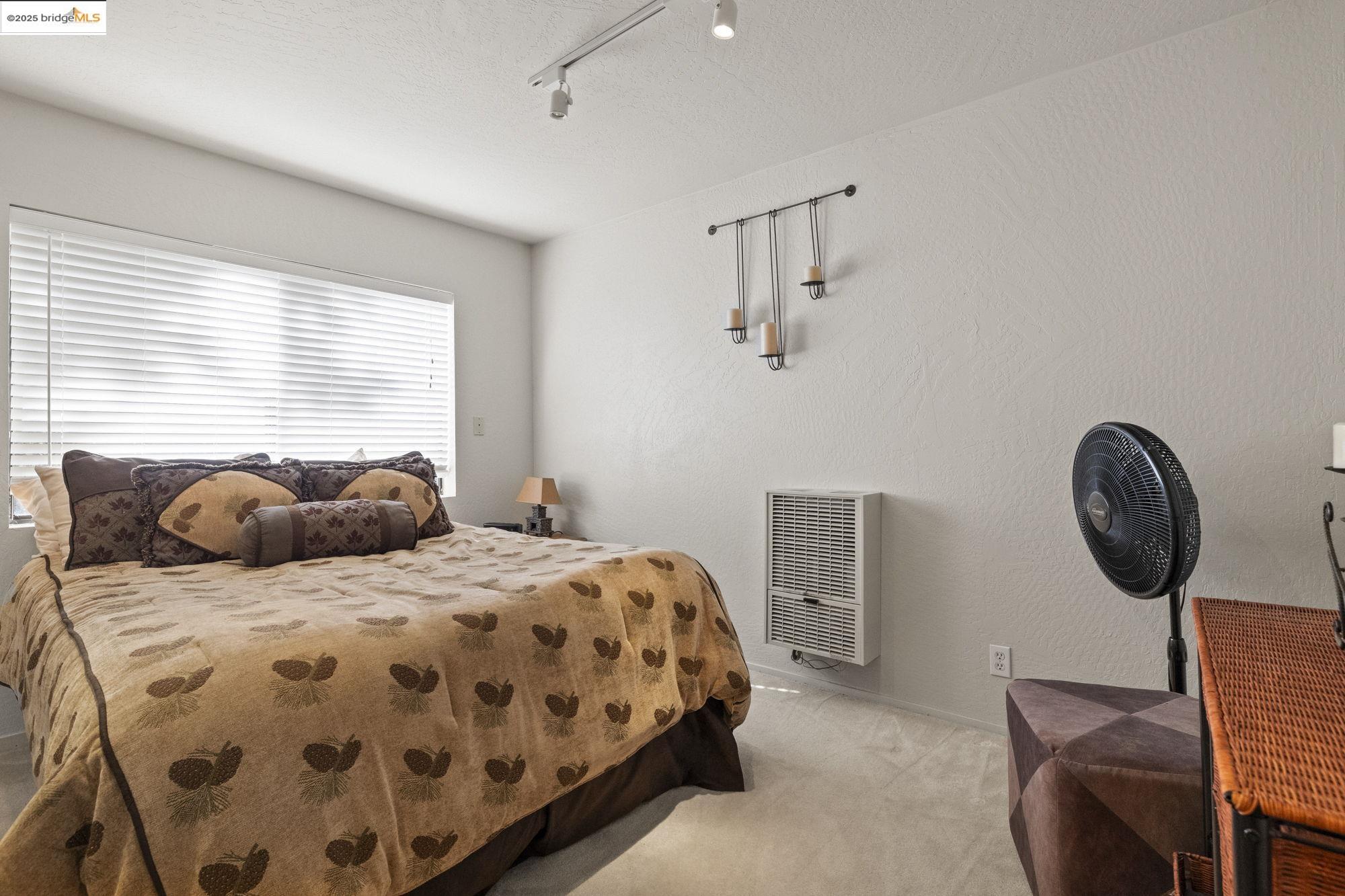 29803 West Mono Road Cold Springs, CA 95335 - Photo 37 of 51 a bedroom with two beds and painting on the wall