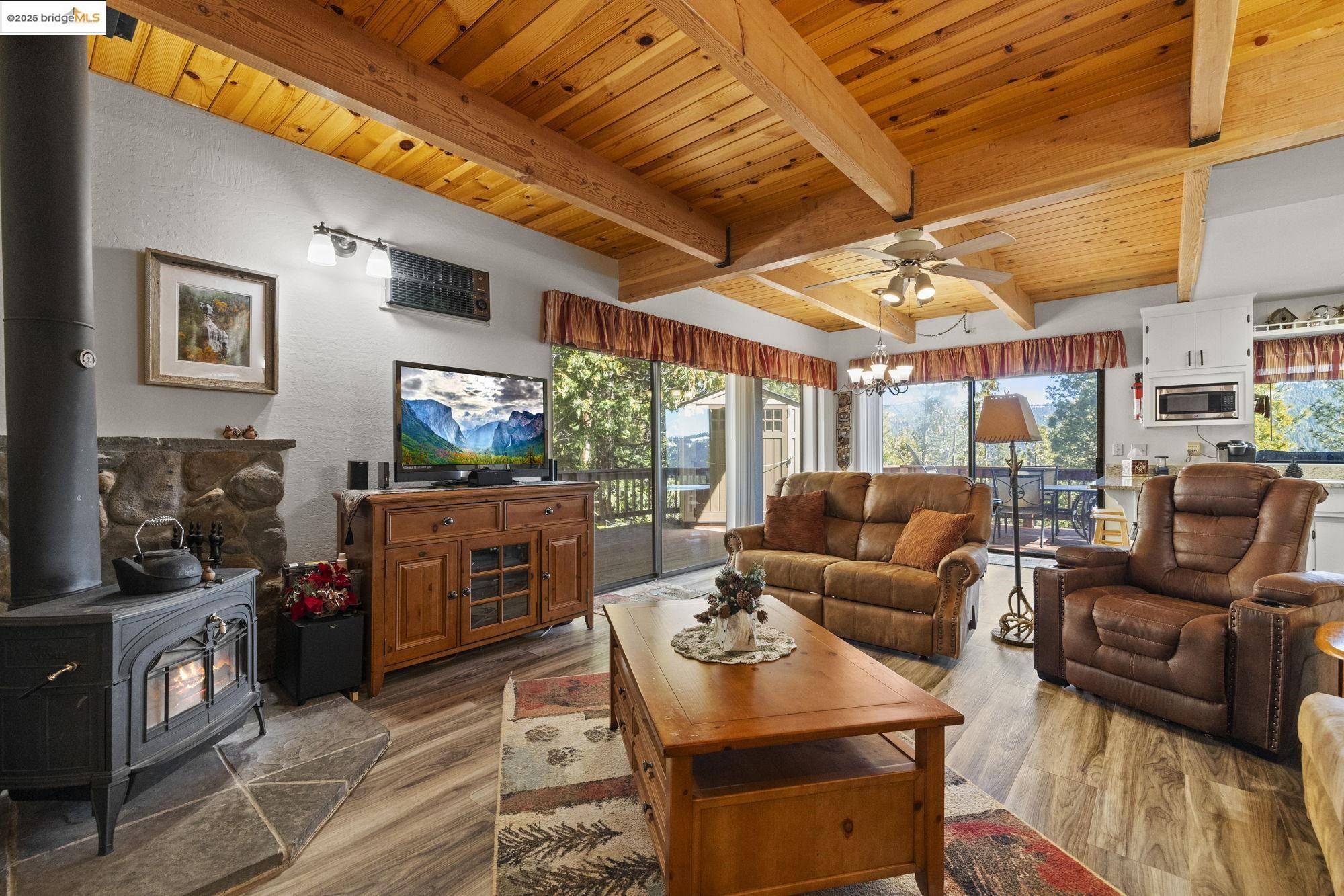 29803 West Mono Road Cold Springs, CA 95335 - Photo 5 of 51 a living room with furniture and a flat screen tv
