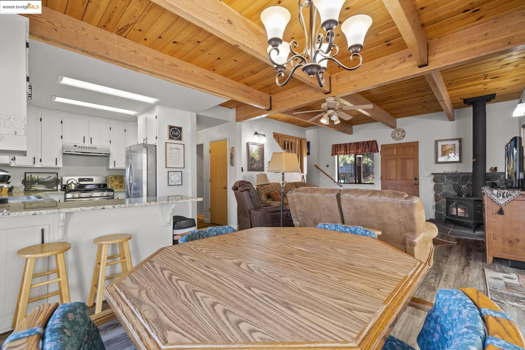 29803 West Mono Road Cold Springs, CA 95335 - Photo 8 of 51 a bed room with a bed and a view of living room