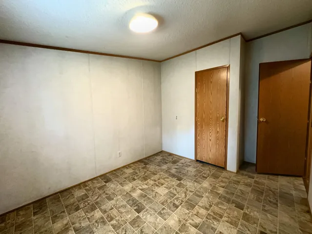 a view of a backyard with a garden