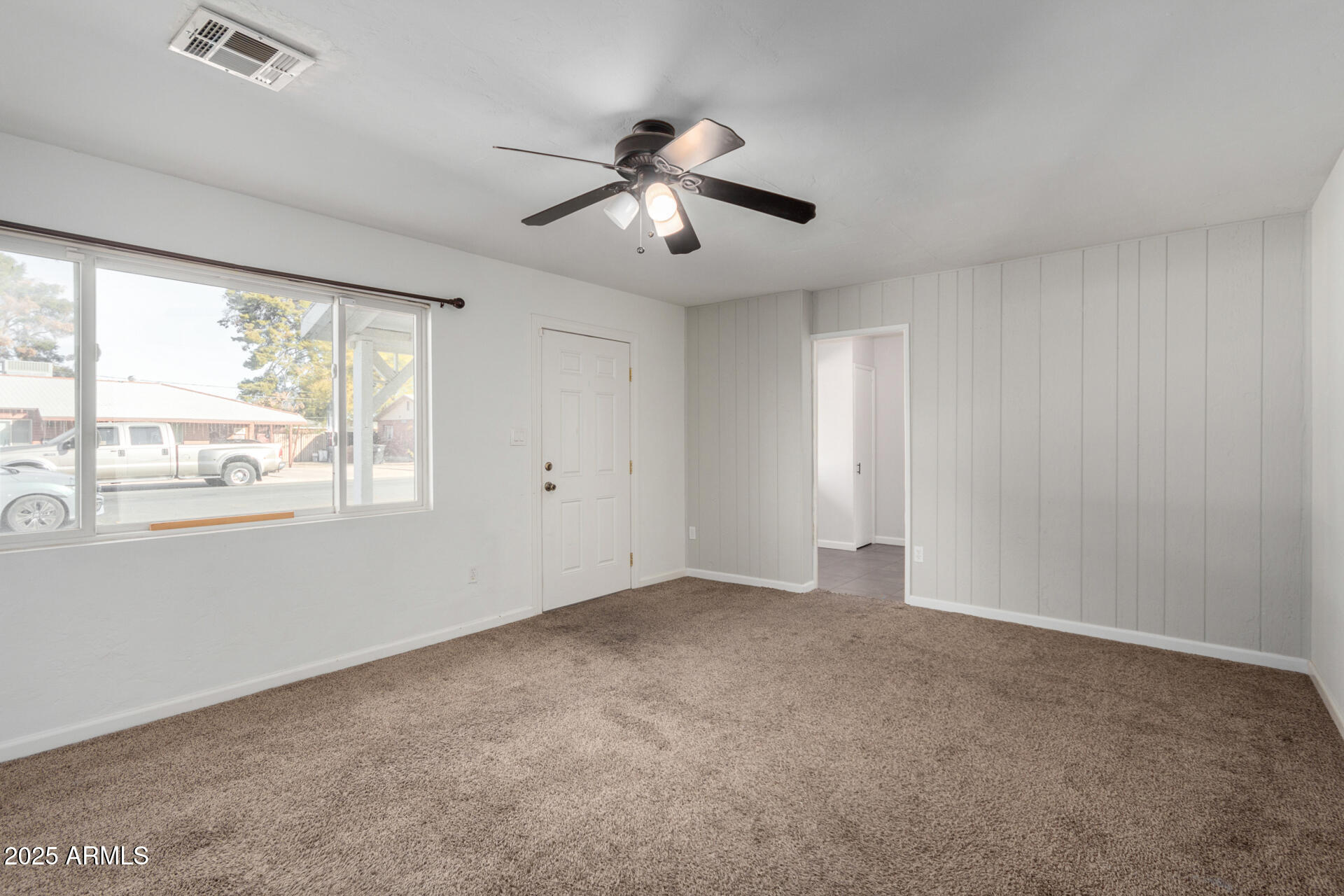 1061 West 5th Street Mesa, AZ 85201 - Photo 12 of 29 a view of an empty room with a window