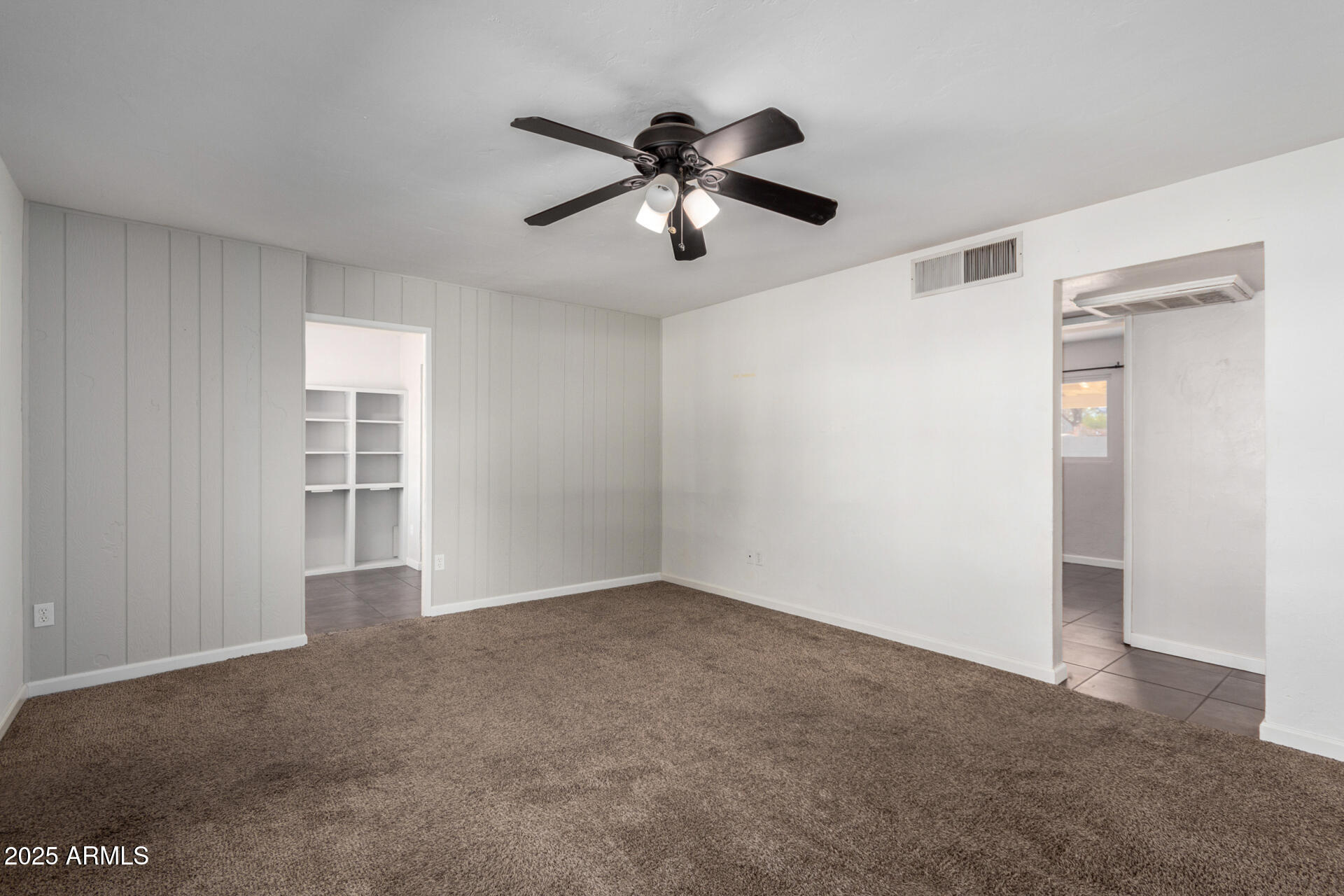 1061 West 5th Street Mesa, AZ 85201 - Photo 14 of 29 a view of empty room with ceiling fan