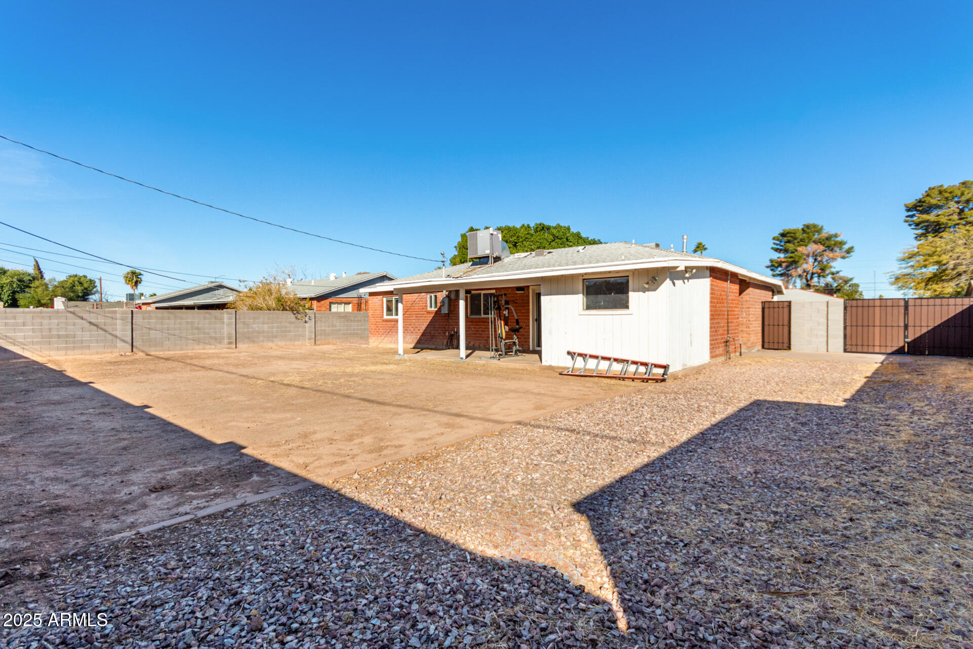1061 West 5th Street Mesa, AZ 85201 - Photo 24 of 29 a front view of a house with a yard
