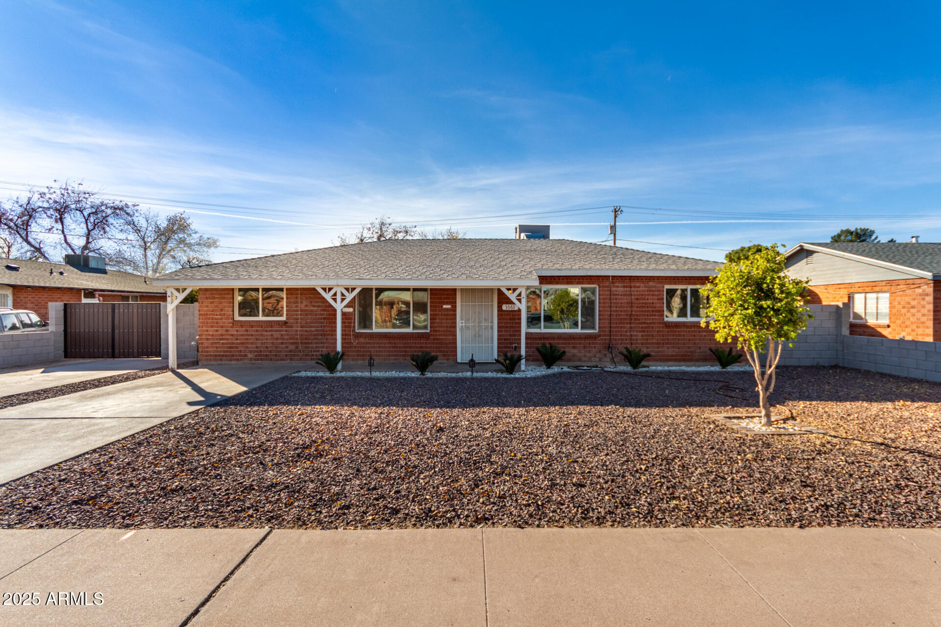 1061 West 5th Street Mesa, AZ 85201 - Photo 28 of 29 front view of a house with a yard