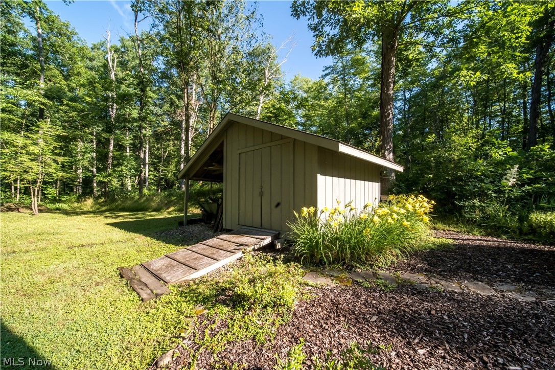 5119 Hattrick Road Ravenna, OH 44266 - Photo 32 of 33 View of outdoor structure featuring a lawn