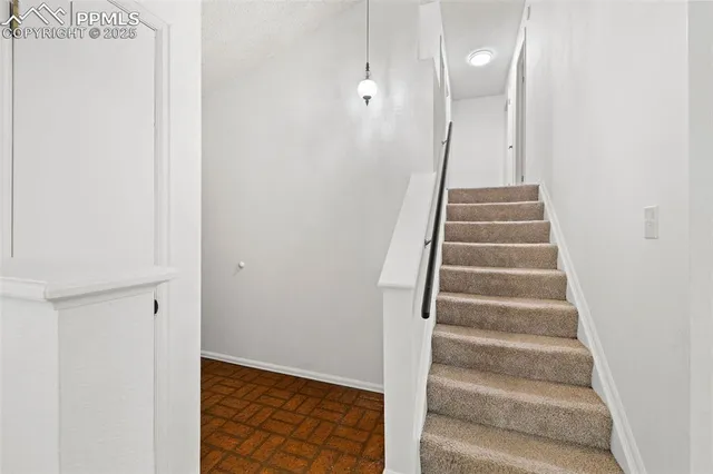 a view of an entryway with staircase