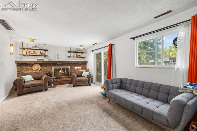 a living room with furniture and a couch