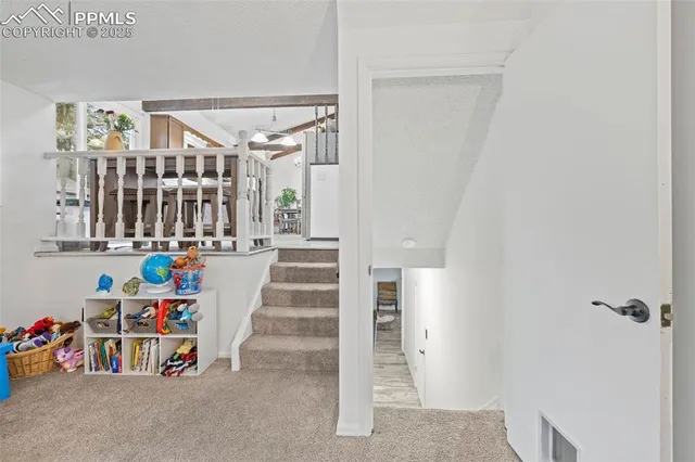 a view of hallway with stairs