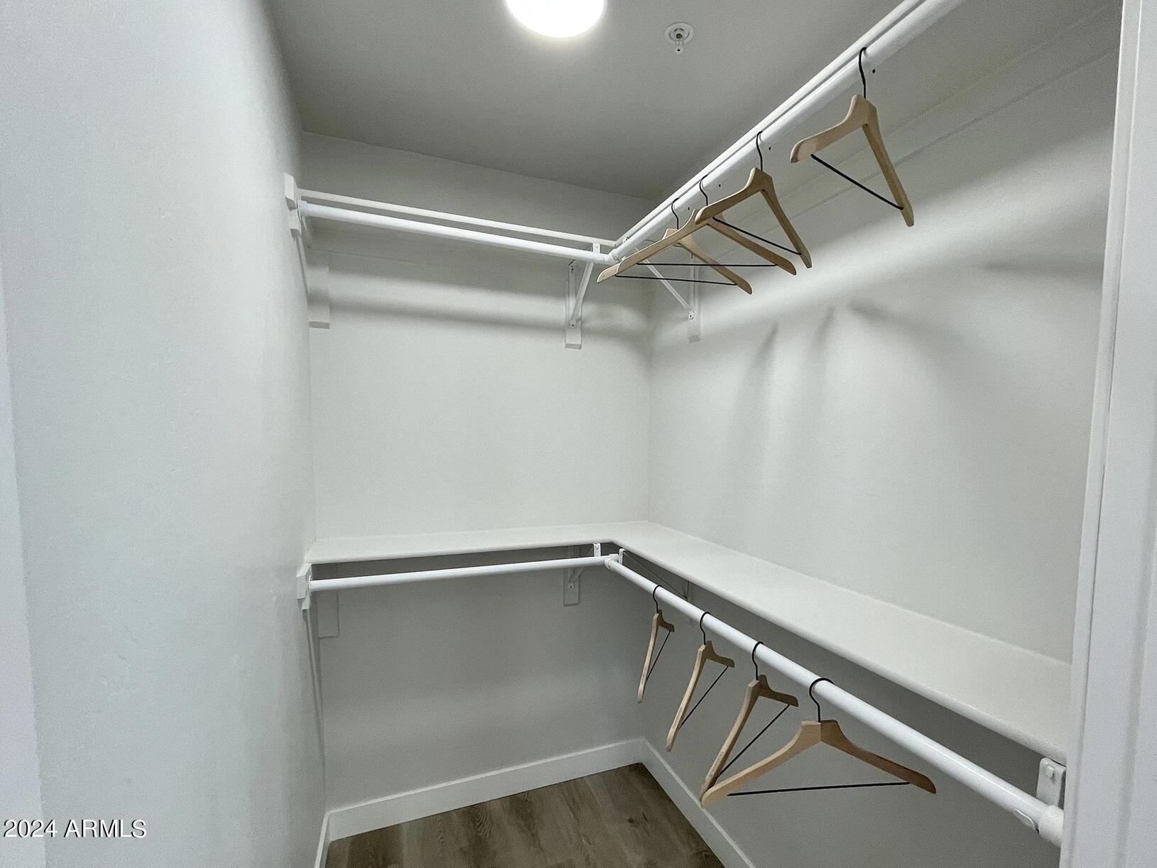 815 East Roma Avenue, Unit 5 Phoenix, AZ 85014 - Photo 17 of 28 a view of an empty walk in closet