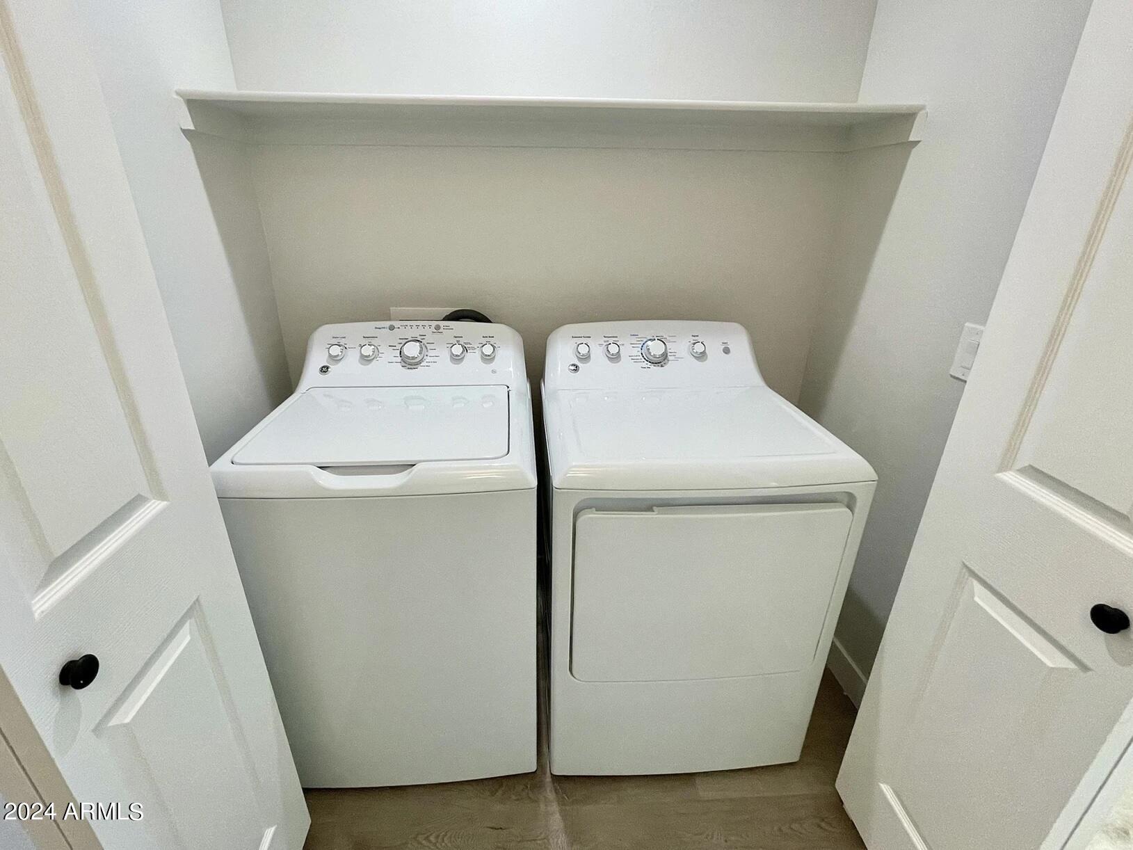 815 East Roma Avenue, Unit 5 Phoenix, AZ 85014 - Photo 19 of 28 a utility room with dryer and washer