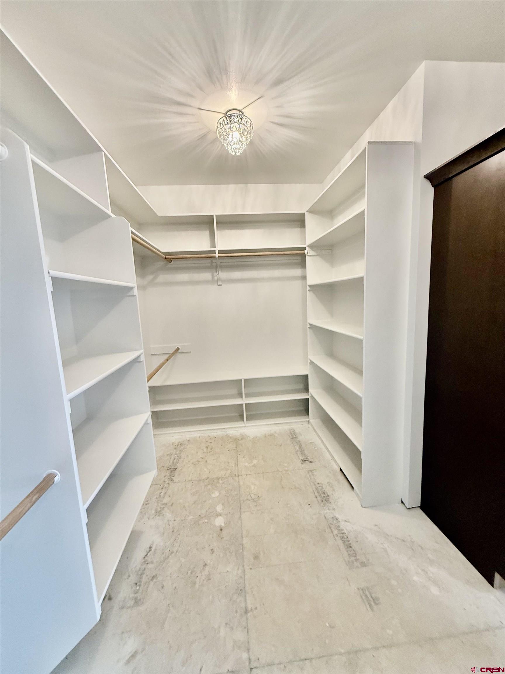 21470 Government Springs Road Montrose, CO 81403 - Photo 14 of 25 a room with a walk in closet and a window